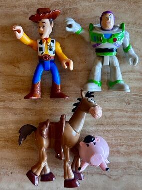 Toy Story Lot (4) of Action Figures. Woody, Buzz, Bullseye and Hamm.